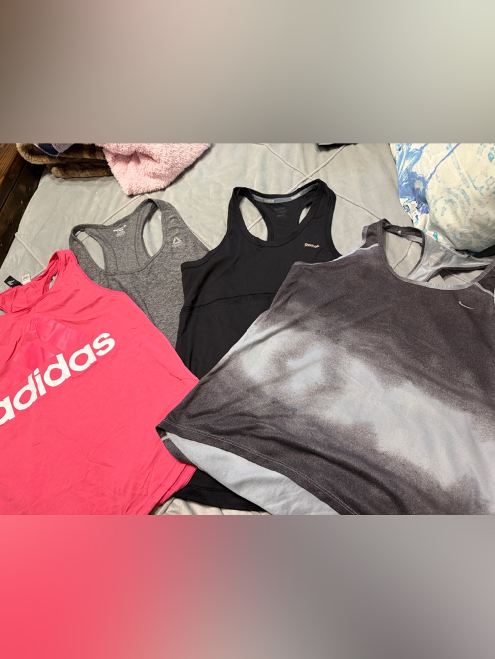 4 name brand Razor back tanks